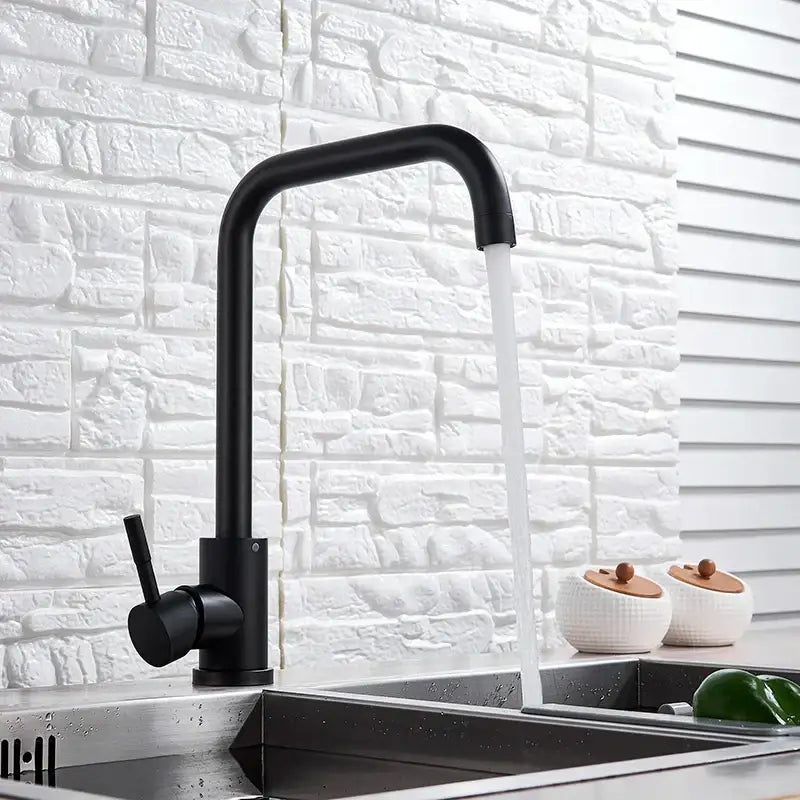Matte black decorbites kitchen faucet with sleek curved spout and single lever handle in brushed nickel finish