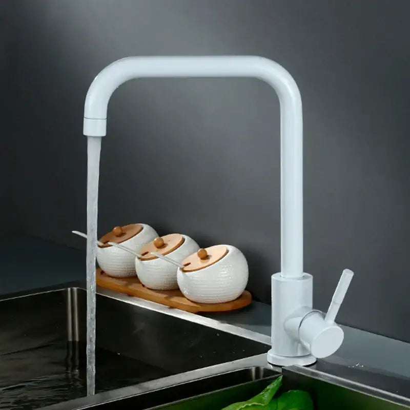 White ceramic kitchen faucet with curved spout and minimalist design for decorbites kitchen faucet collection