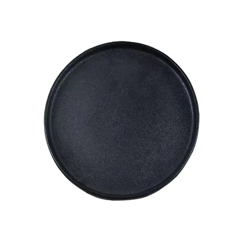 Black ceramic dinner plate with matte finish and raised rim ideal for decorbites black ceramic dining use