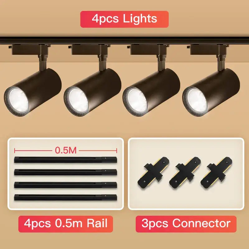 Set of four matte black cob chandelier track ceiling spotlights with adjustable heads mounted on a rail system