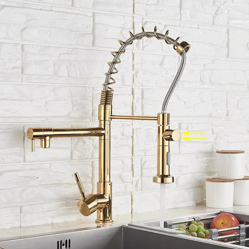 Gold-colored kitchen faucet with flexible spring hose and pull-down spray head in matte black decorbites brass swivel spout design