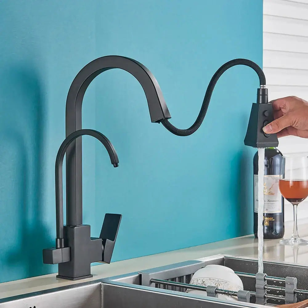 Matte black dual handle kitchen faucet with pull-down spray head and flexible hose by decorbites dual handle design
