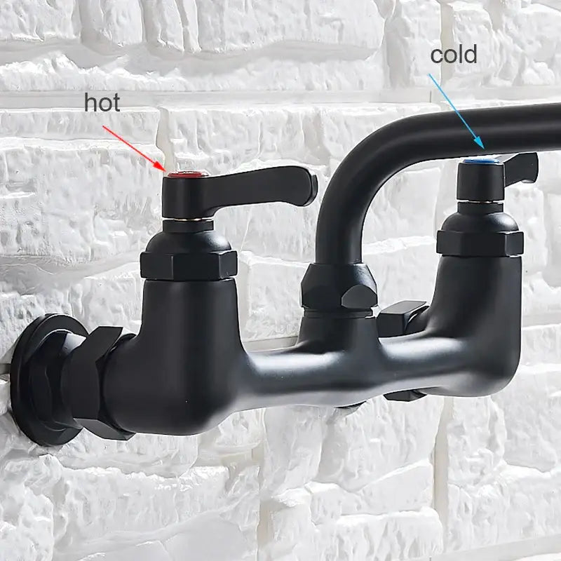 Matte black dual handle kitchen faucet with swivel hot cold water tap and red blue caps on wall-mounted matte finish