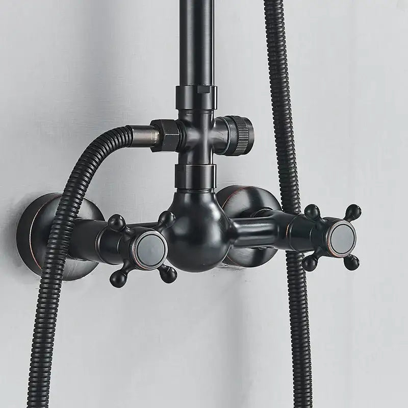 Matte black dual handle shower mixer tap featuring a black matte brass shower faucet with cross-shaped handles and hoses