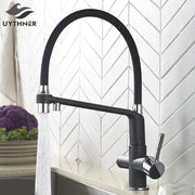 Matte black dual spout water filter faucet with a sleek curved spout and chrome accents for kitchen use