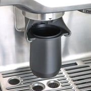 Matte black espresso dosing cup with handle featuring a sleek cylindrical design and black matte finish for espresso dosing