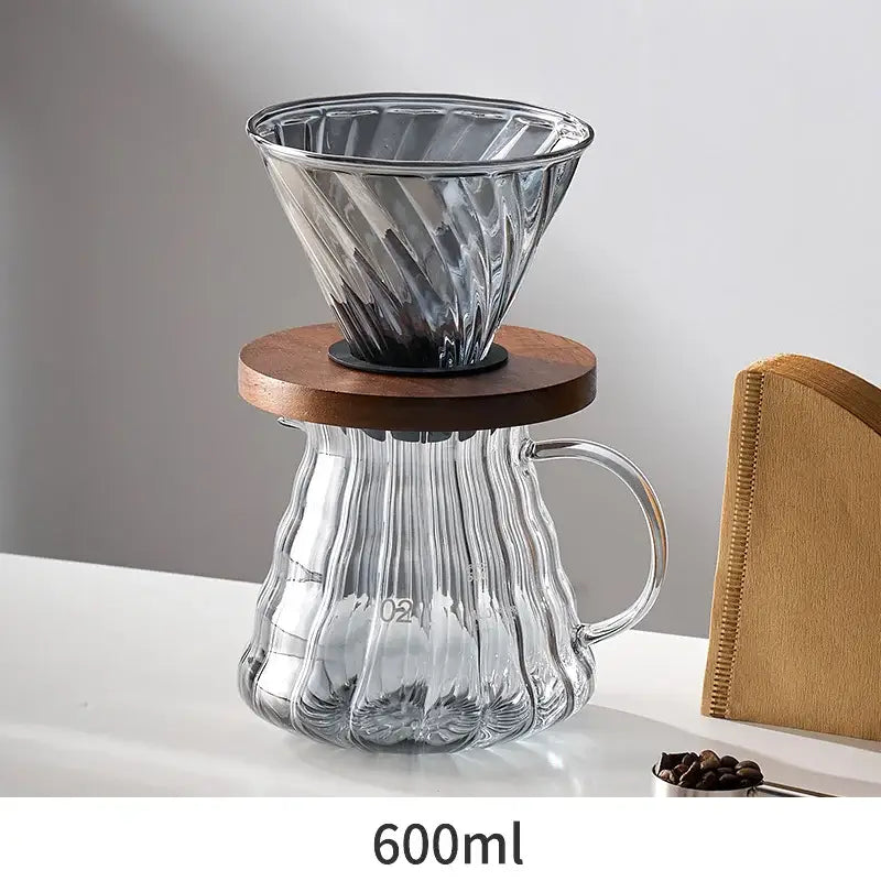 Clear glass pour-over coffee dripper with fluted design on 600ml carafe paired with matte black gooseneck spout kettle hand punch coffee pot