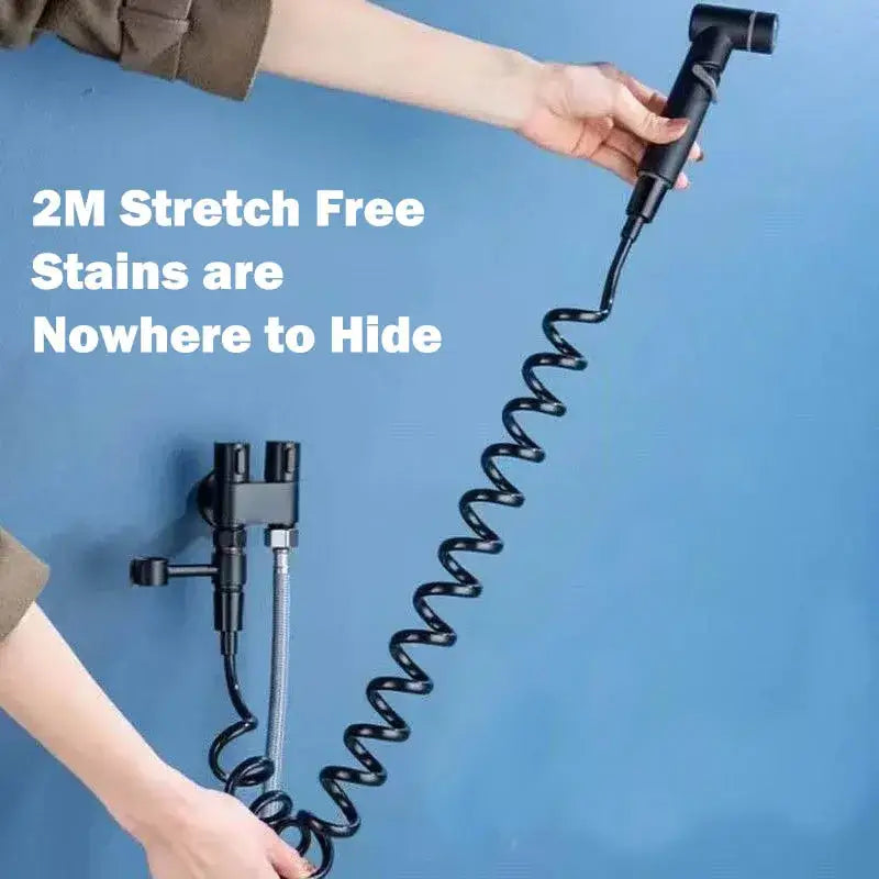Matte black hygienic bidet sprayer with flexible coiled hose and matching handheld spray head for bathroom use by decorbites