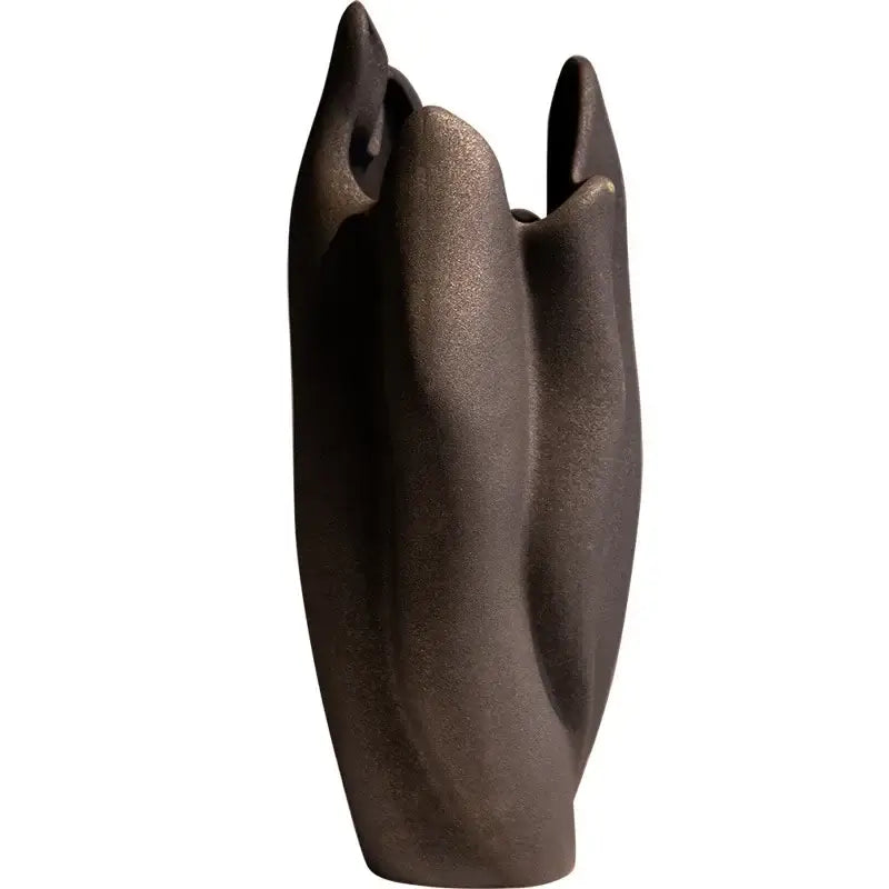 A sleek dark bronze sculptural irregular pleated ceramic vase with smooth curves for living room decorbites decor