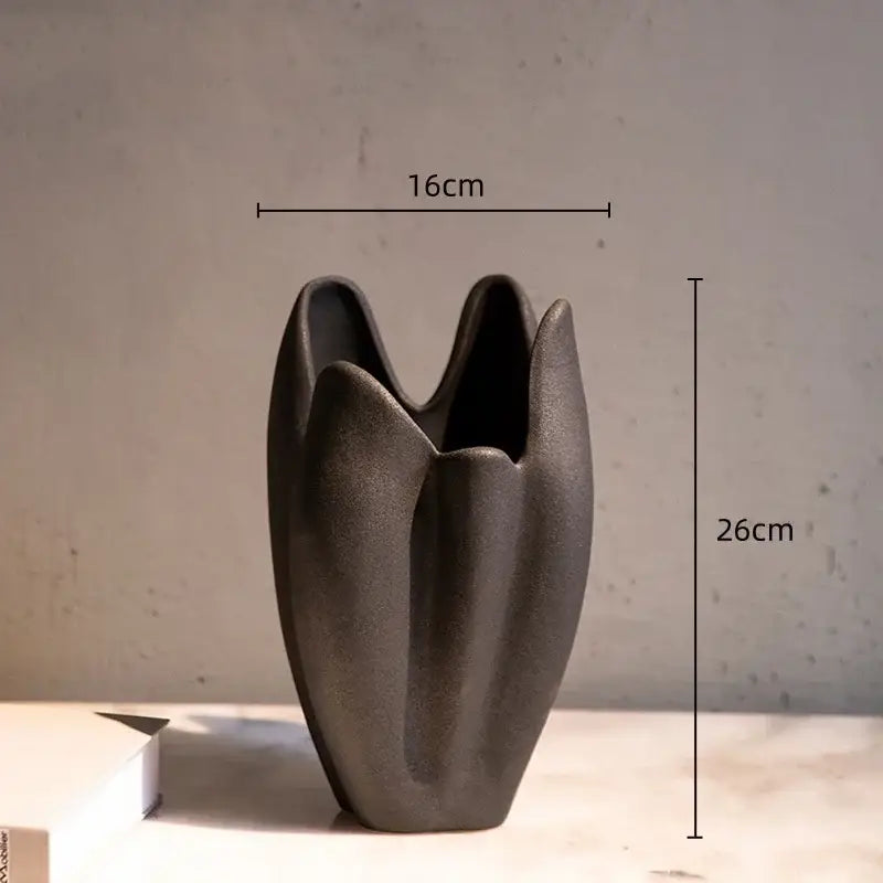 Dark gray irregular pleated ceramic vase with a tulip-like sculpted form for modern decorbites irregular pleated decor