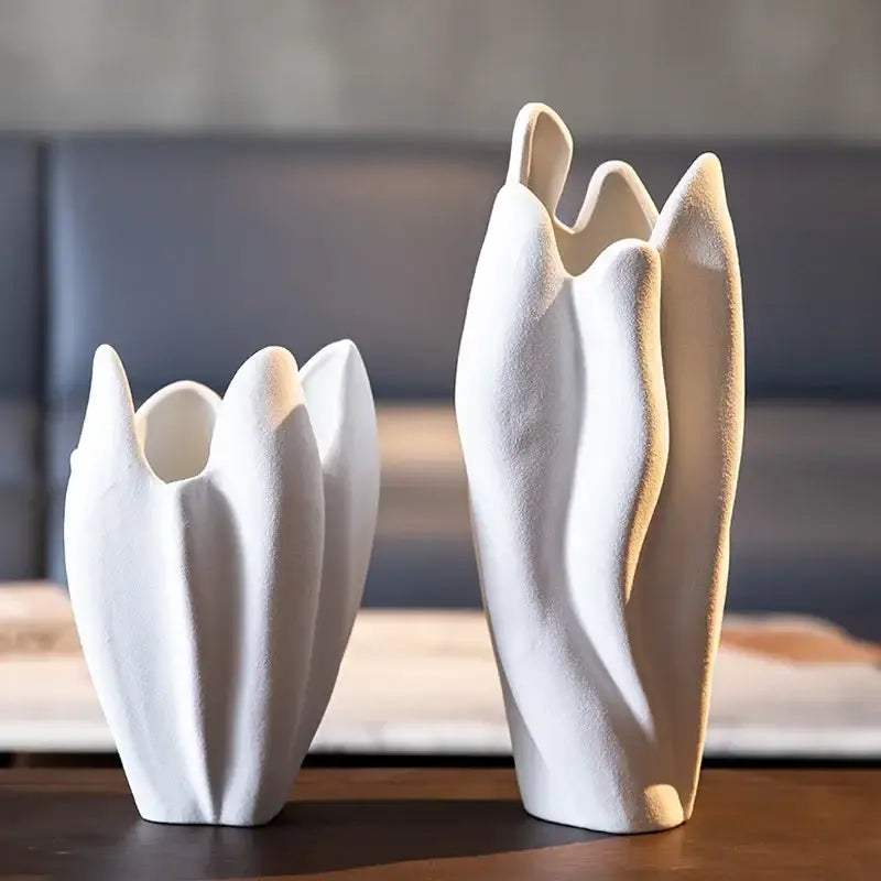 Two white ceramic vases with tulip-like sculpted design from decorbites irregular pleated ceramic vase set for decor
