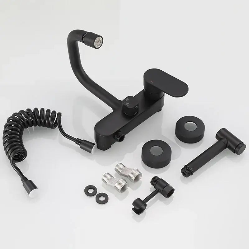 Matte black kitchen mixer tap with curved spout flexible coiled hose and separate handheld showerhead mixer tap