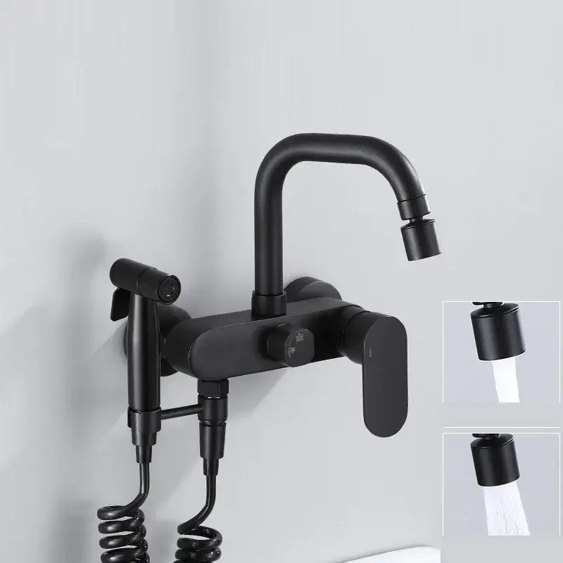 Matte black kitchen mixer tap with wall-mounted dual handles and integrated handheld showerhead in matte finish