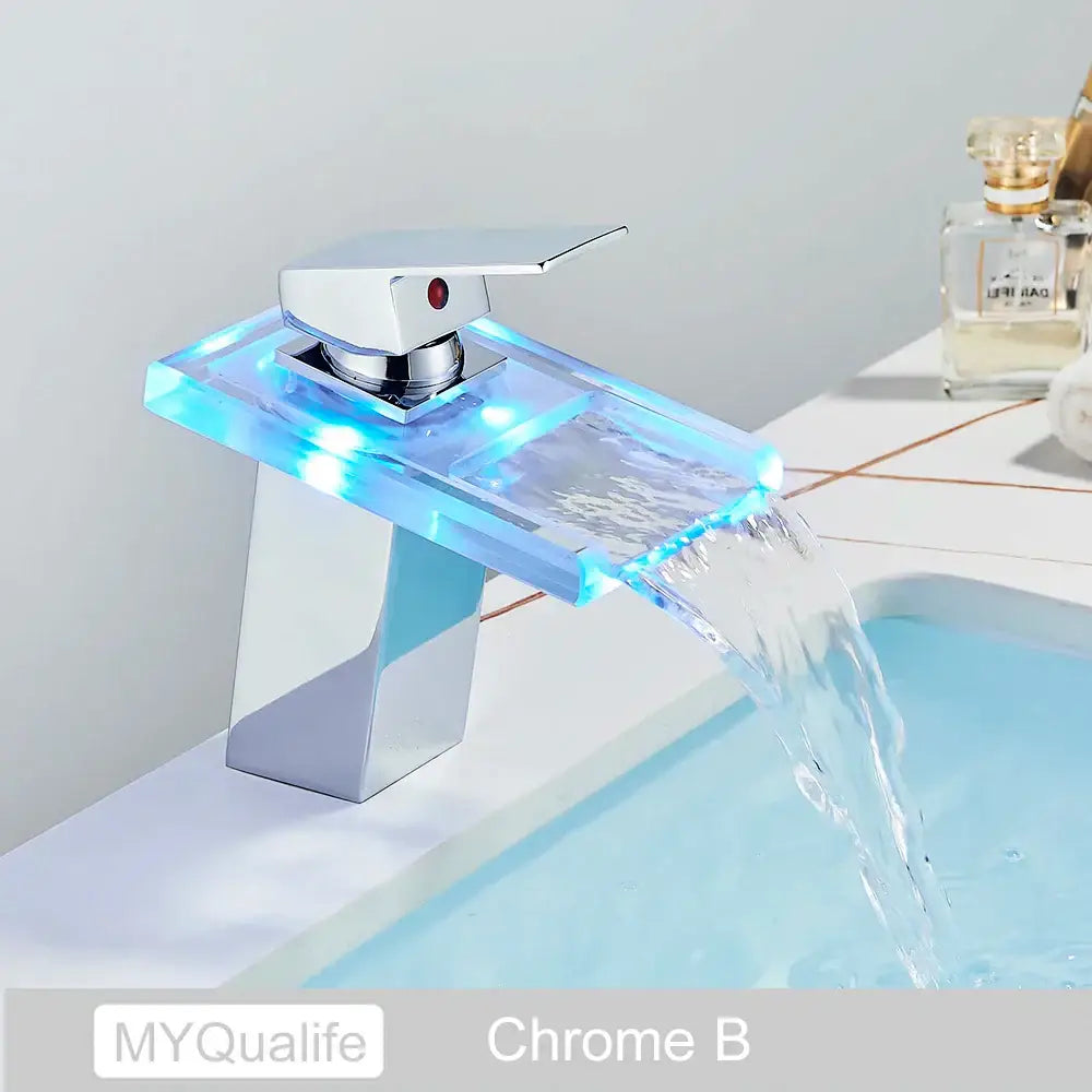 Chrome finished basin faucet with translucent blue acrylic spout and led lighting for decorbites led waterfall basin use