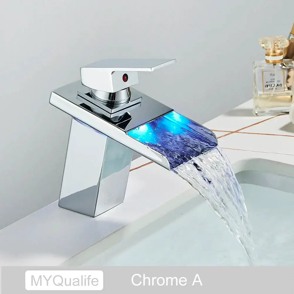 Chrome-finished decorbites led waterfall basin faucet with glowing blue led accent for bathroom glass decor