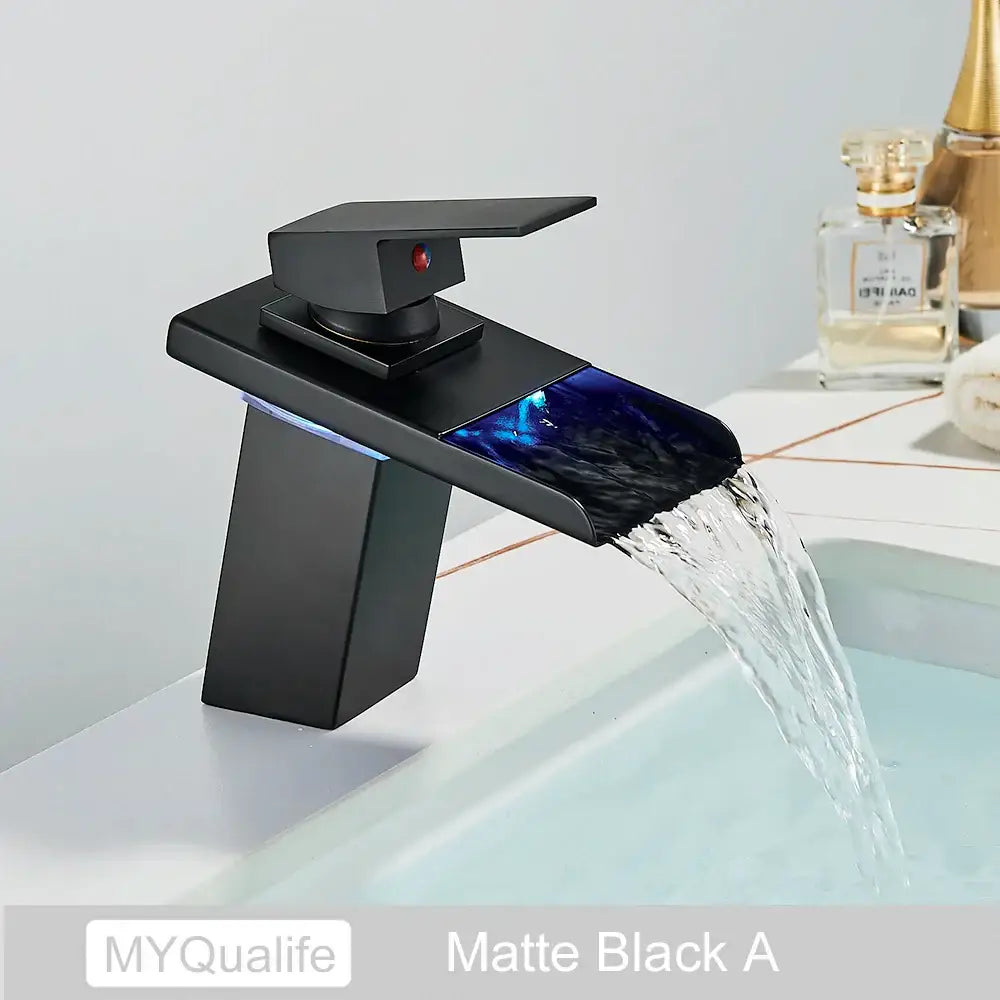 Matte black led waterfall basin faucet with illuminated blue glass accent for modern bathroom decorbites led waterfall design
