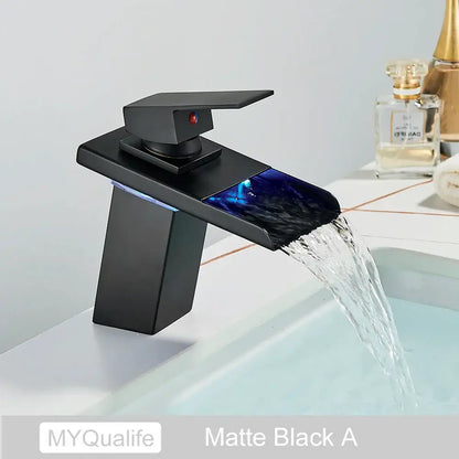 Matte black led waterfall basin faucet with illuminated blue glass accent for modern bathroom decorbites led waterfall design