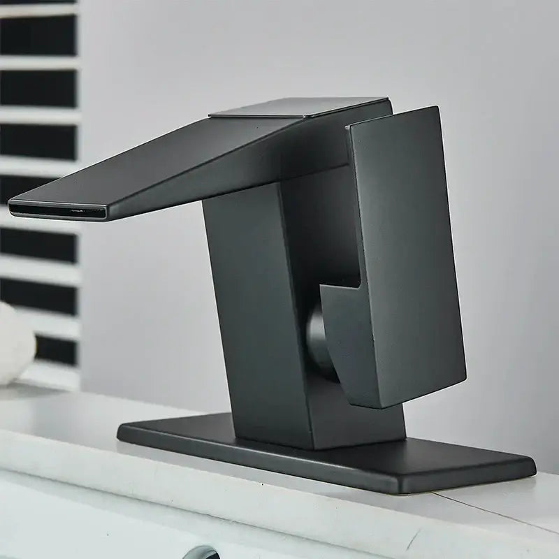 Matte black led waterfall basin faucet with angular minimalist design and flat rectangular spout by decorbites led waterfall