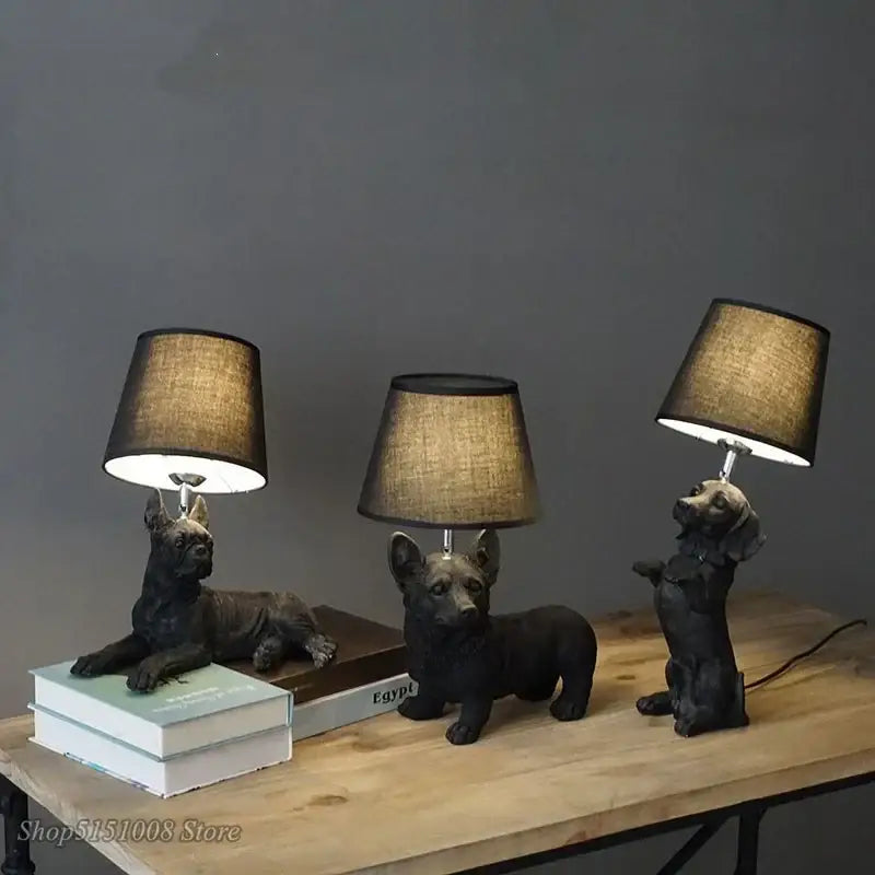 Three black resin puppy dogs table lamps with textured fabric shades for bedroom decor and dogs table use