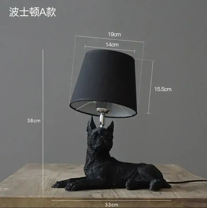 Matte black puppy dogs table lamp with a sleek black cylindrical shade for bedroom decor