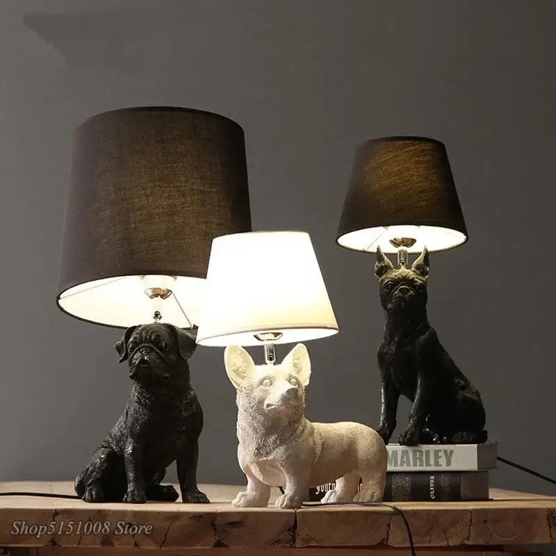 Matte black and off-white puppy dogs table lamps with resin figurines and fabric shades for bedroom decor
