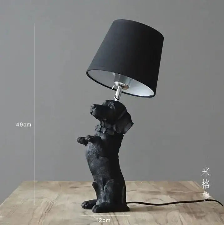 Matte black resin dachshund puppy dogs table lamp with a sleek minimalist design for bedroom decor