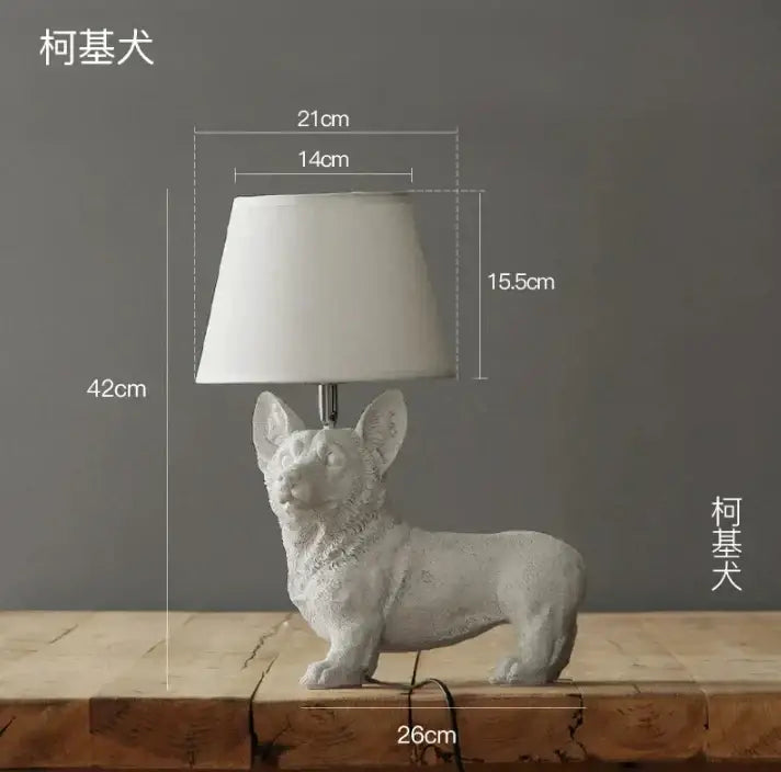 White ceramic puppy dogs table lamp with matte finish and tapered off-white fabric shade for bedroom decor
