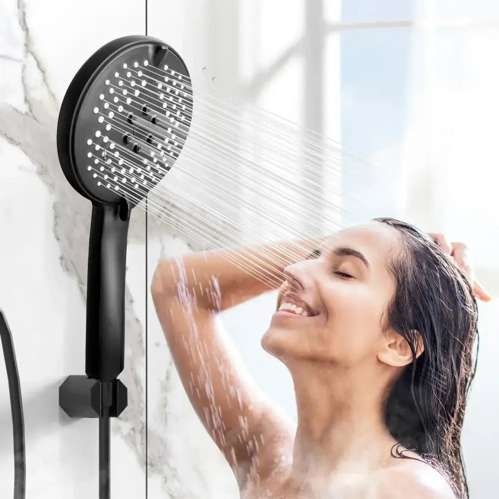 Matte black pressure boost shower head with hose featuring multiple nozzles and sleek modern design for bathroom use