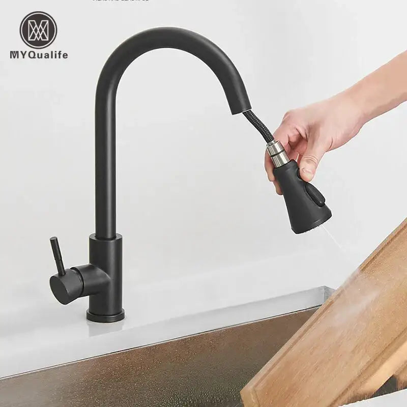 Matte black kitchen sink faucet with pull-out spray head and single lever handle for versatile kitchen use