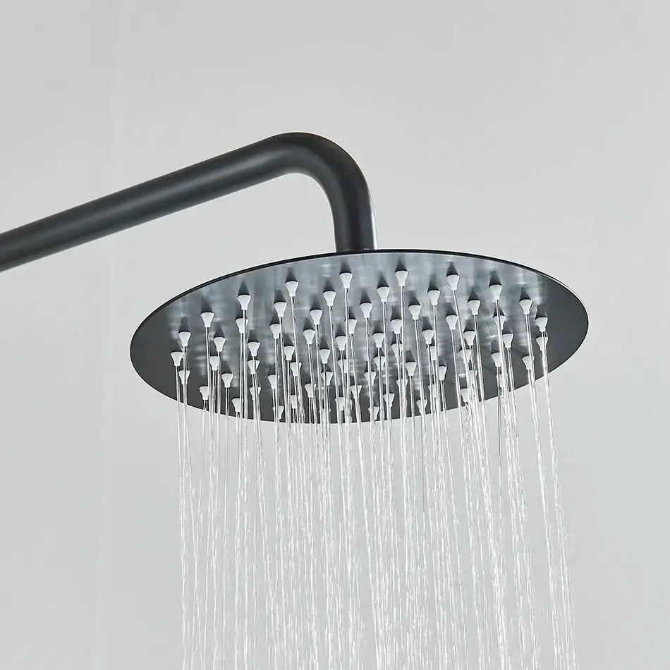 Matte black rainfall shower faucet set with a black matte-finished round showerhead with multiple water jets for bathroom
