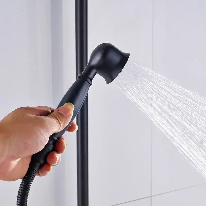 Matte black shower faucet set featuring a black matte-finish handheld showerhead with ergonomic design for bathroom use