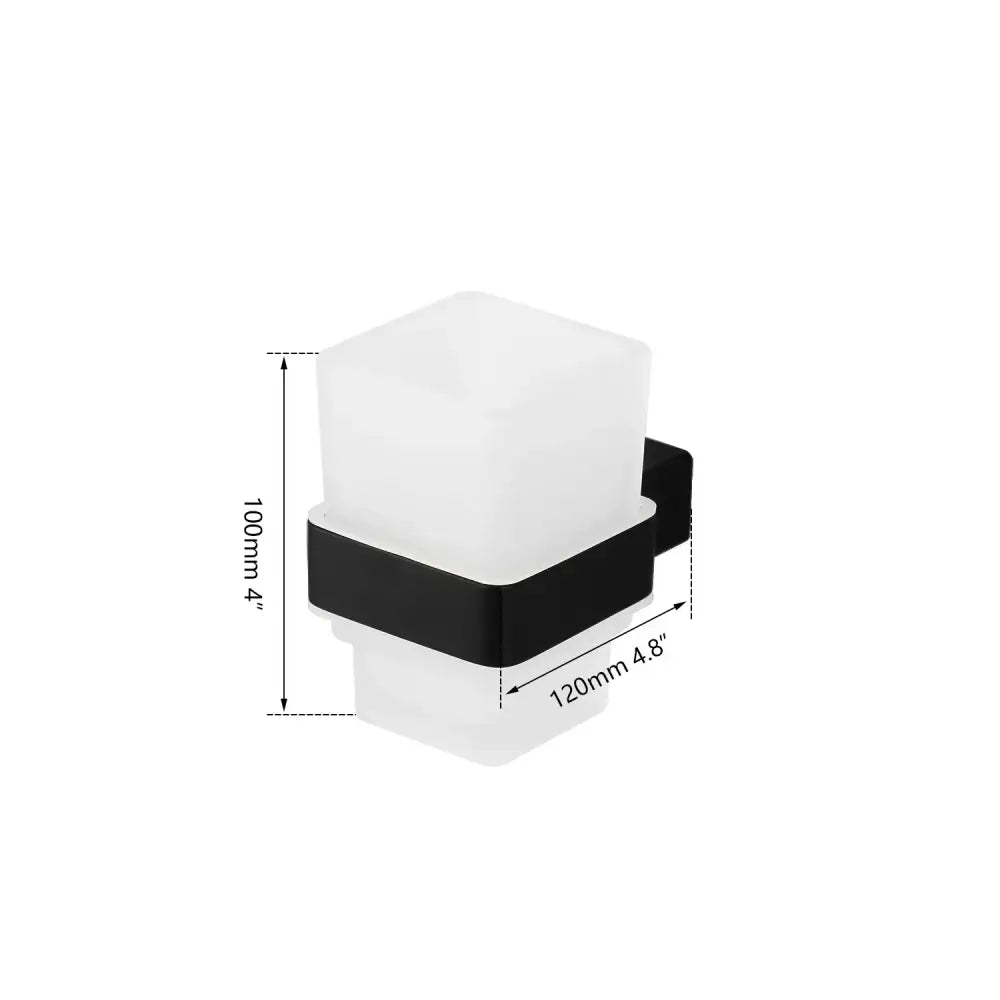Modern black and white glass soap dispenser part of a matte black stainless steel bathroom hardware set with frosted glass