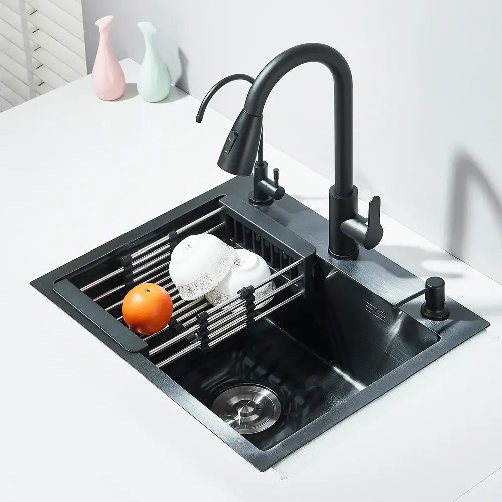 Matte black stainless steel kitchen sink with undermount design and matching retractable gooseneck faucet