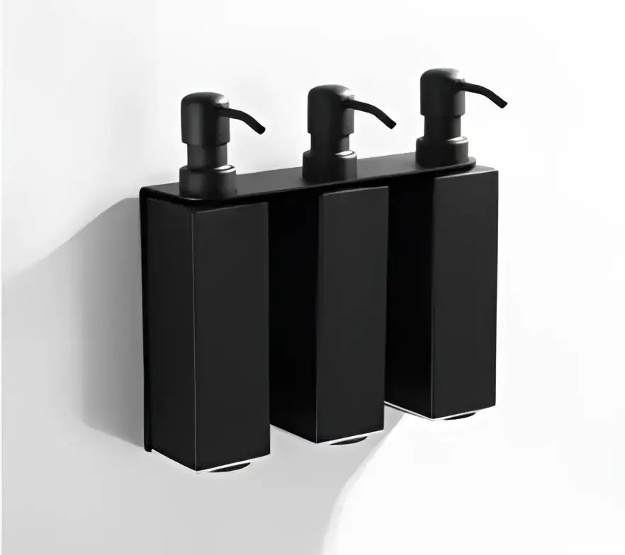 Matte black stainless steel soap dispenser set with three wall-mounted black stainless steel pump bottles decorbites black stainless