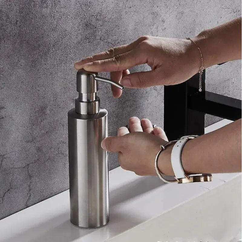 Matte black stainless steel soap dispenser with sleek cylindrical body and polished finish for bathroom decorbites black stainless