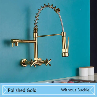 Polished gold kitchen faucet with flexible coiled hose and cross handles contrasted with decorbites black wall-mounted design