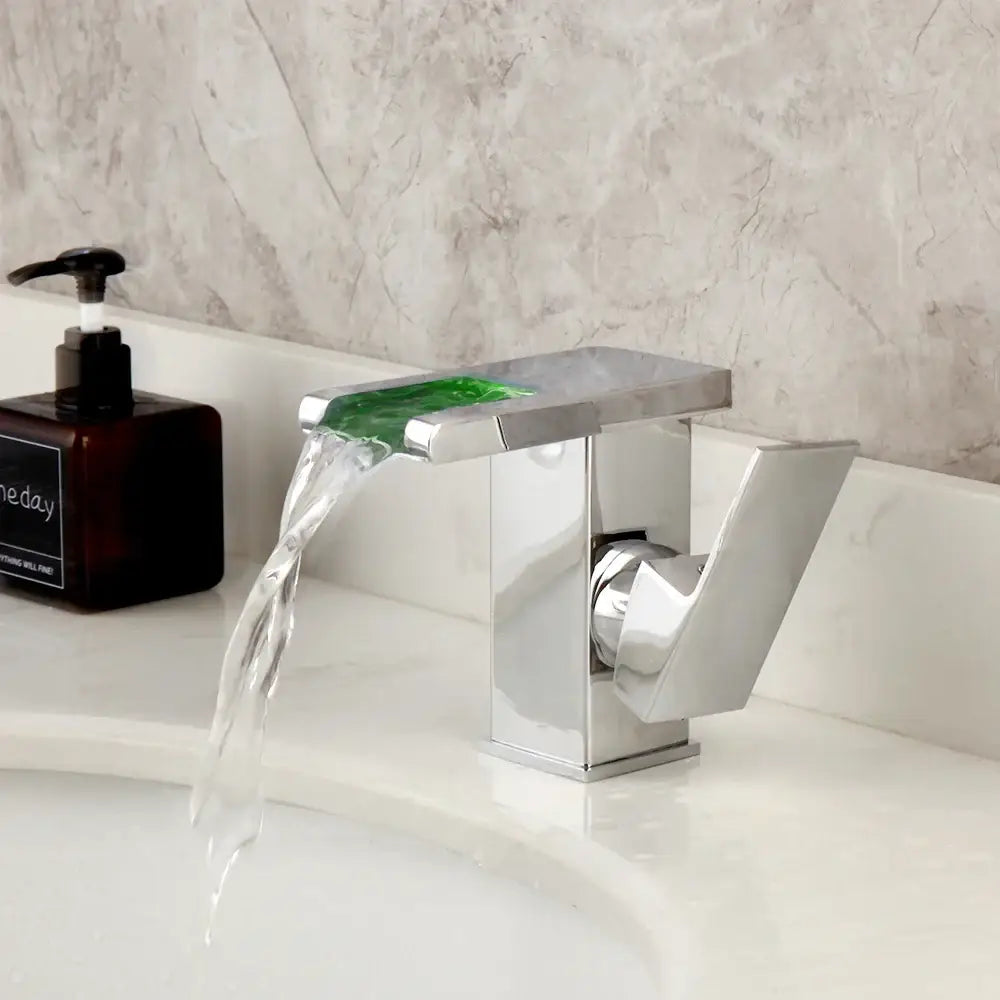Matte black and white led waterfall basin faucet with modern chrome finish and vibrant green glass decorbites led waterfall spout