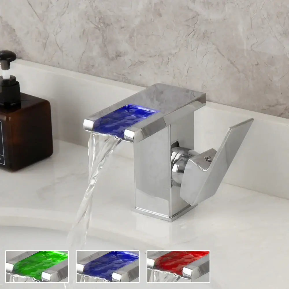 Matte black basin faucet with white led waterfall spout and illuminative blue decorbites led waterfall panel