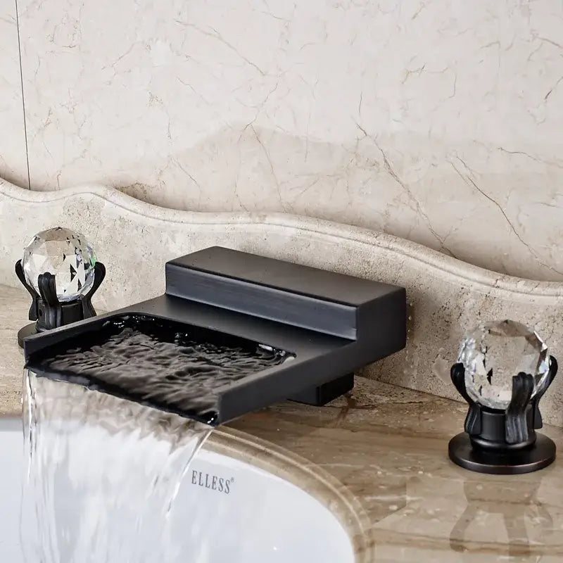 Matte black wide waterfall spout bathroom faucet with black wide waterfall design and crystal globe handles