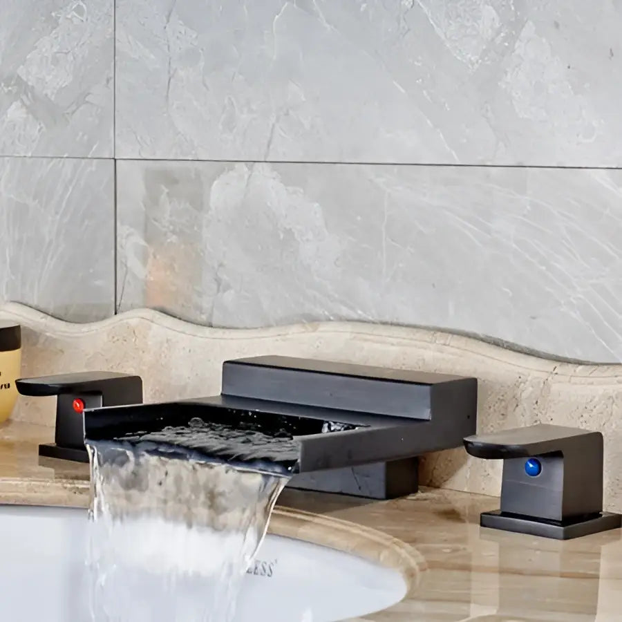 Matte black wide waterfall spout bathroom faucet with a modern rectangular design and dual square handles by decorbites black wide