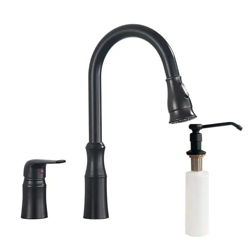 Matte brass black kitchen faucet with pull out spray head in black kitchen faucet finish next to white ceramic soap dispenser