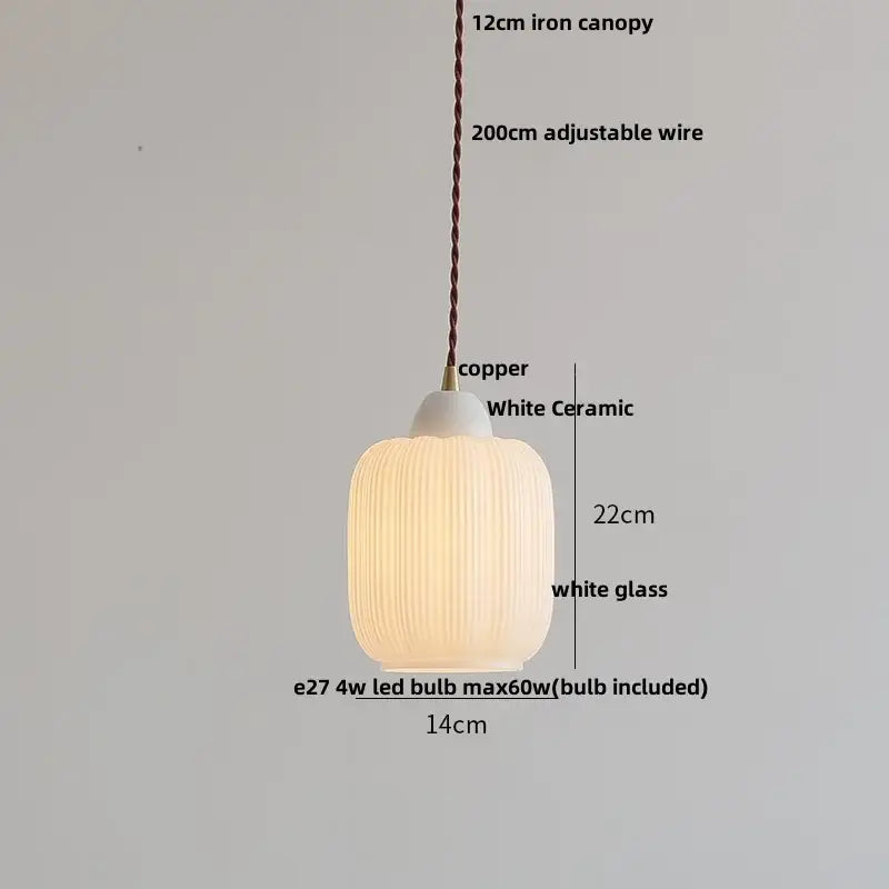 Matte brown and copper ceramic walnut pendant light with white ceramic and glass vertical ridges decorbites ceramic walnut pendant