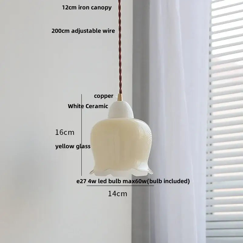 Matte brown and copper ceramic walnut pendant light with white ceramic and yellow glass bell shade by decorbites ceramic walnut pendant
