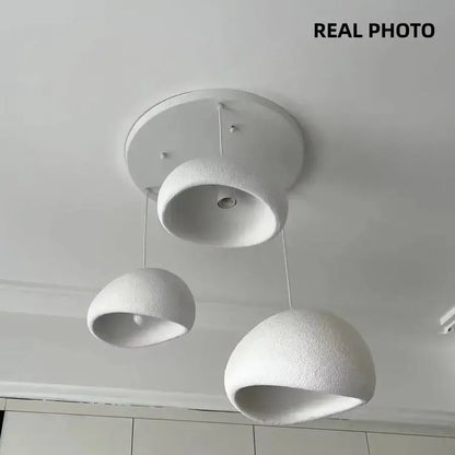 Matte gray led wabi sabi chandelier with white textured dome pendant lights for modern minimalist dining rooms