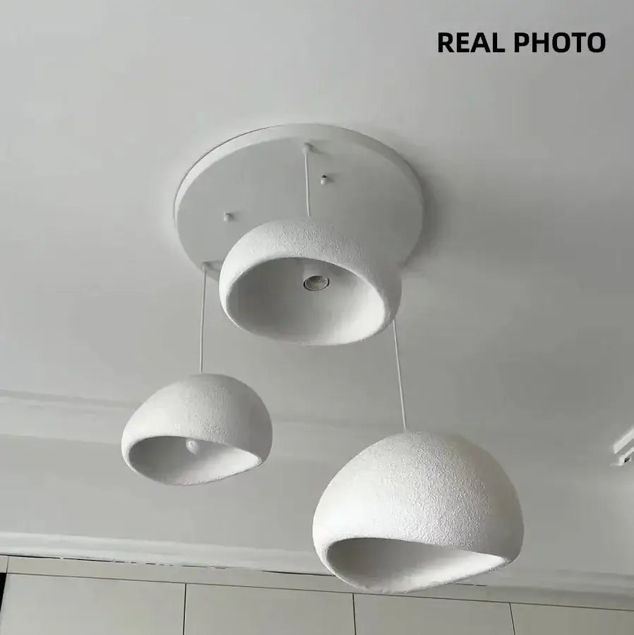 Matte gray led wabi sabi chandelier with white textured dome pendant lights for modern minimalist dining rooms