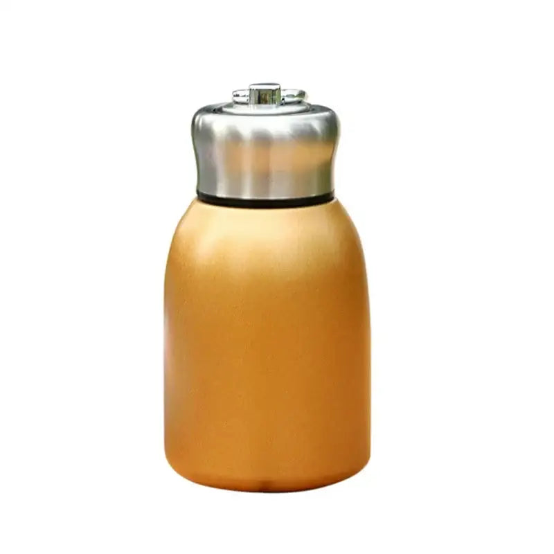 Gold-colored stainless steel vacuum flask with a sleek rounded body and shiny silver lid for travel use