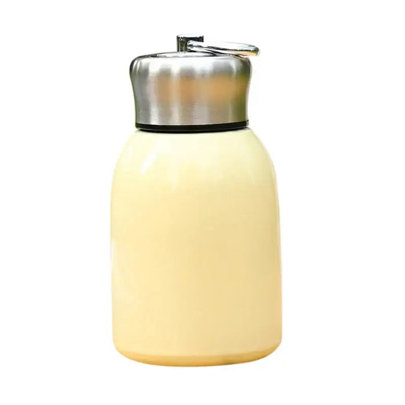 Cream-colored matte pastel stainless steel vacuum flask with insulated body and flip-top lid for travel water bottle use