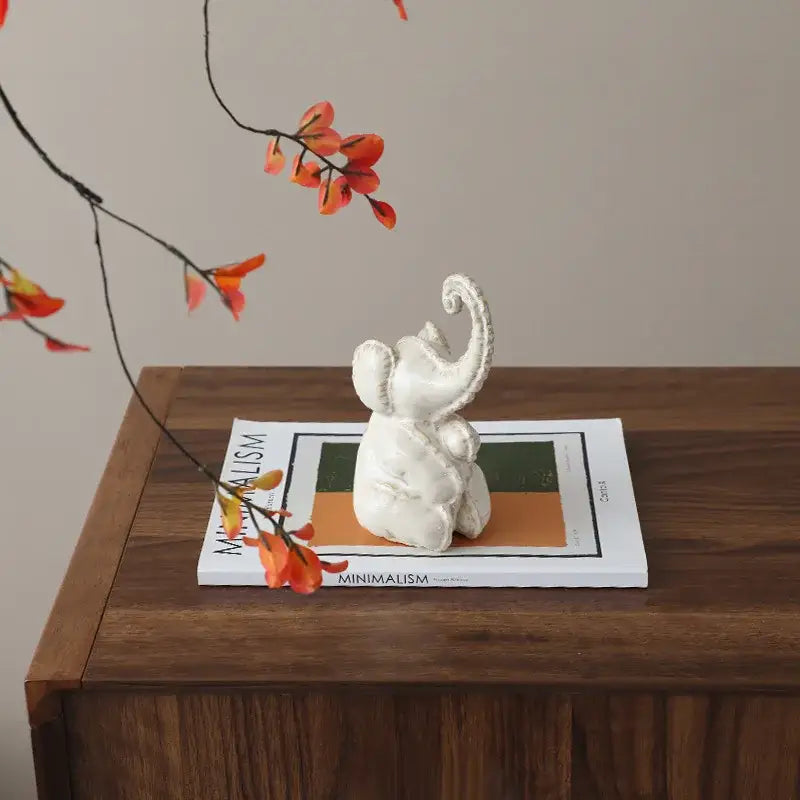 White ceramic elephant figurine with textured distressed finish for home decor and decorbites elephant abstract bubble display