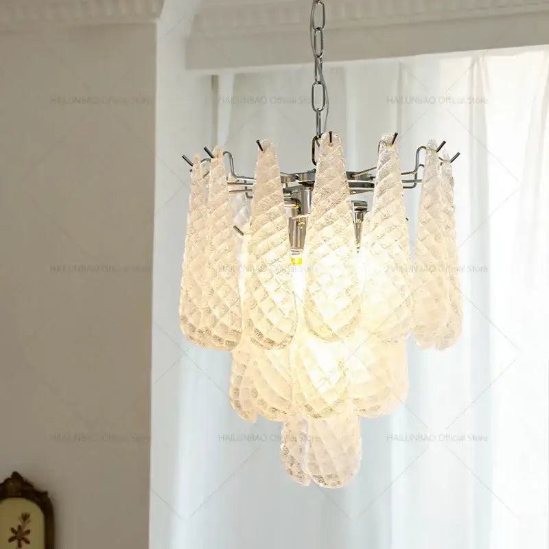 Elegant off-white decorbites crystal glass chandelier with textured diamond pattern and chrome accents for dining room decor
