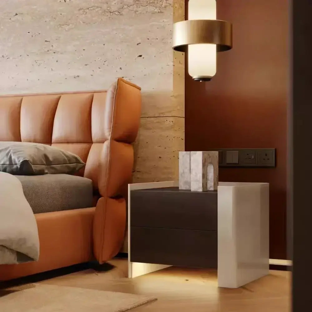 Modern two-tone nightstand with glossy white and matte dark wood finish complementing decorbites glass brass pendant light